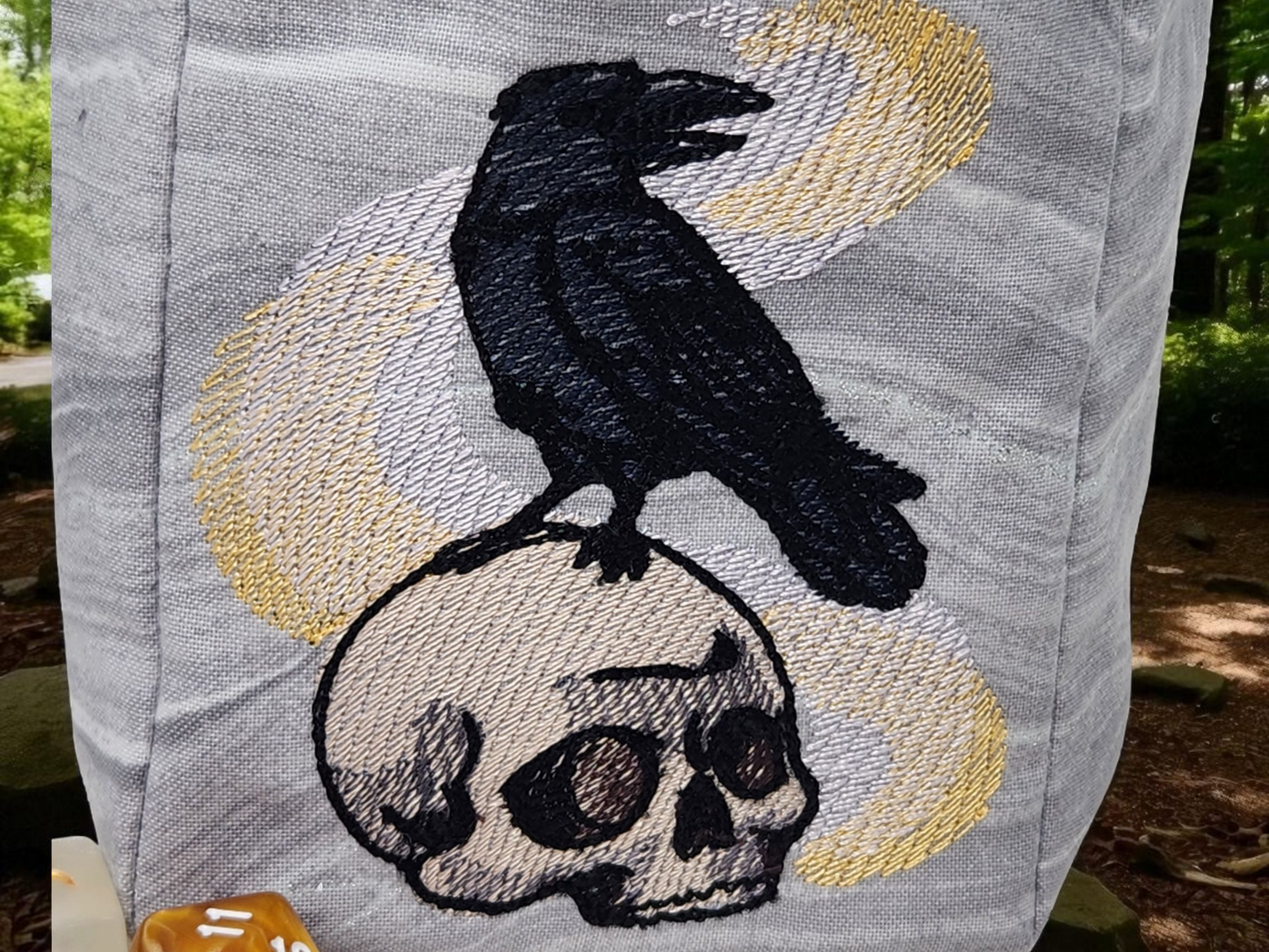 Raven, skull and magic dice bag