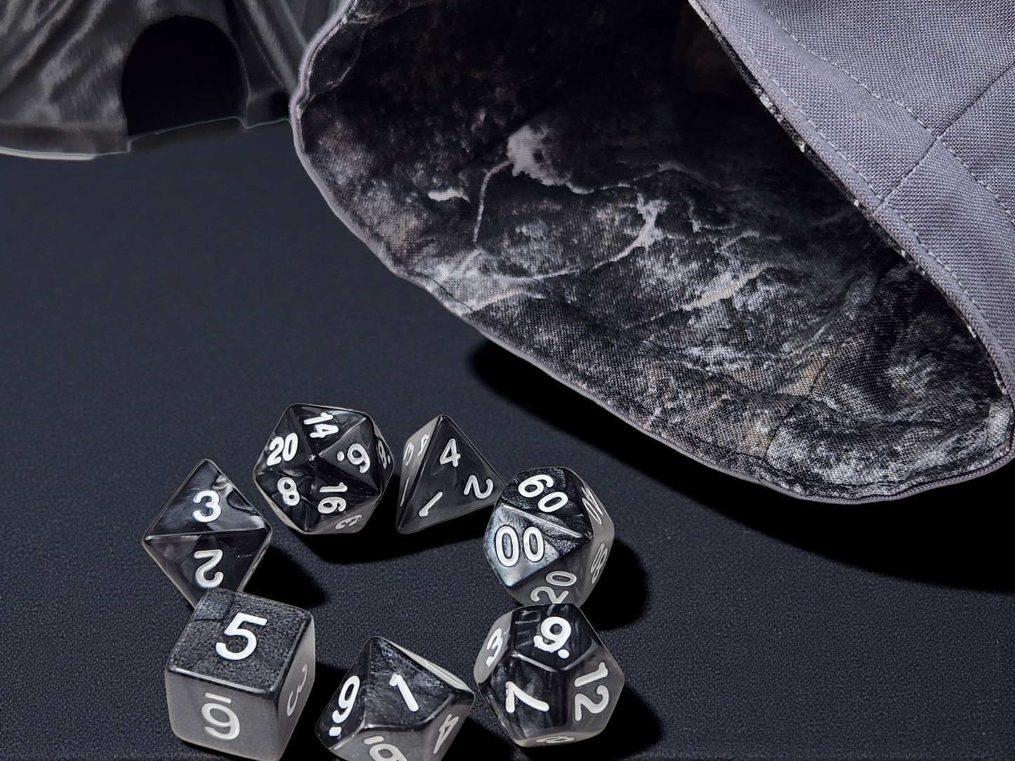Plague doctor gift set, dice tower, dice bag and set of dice.