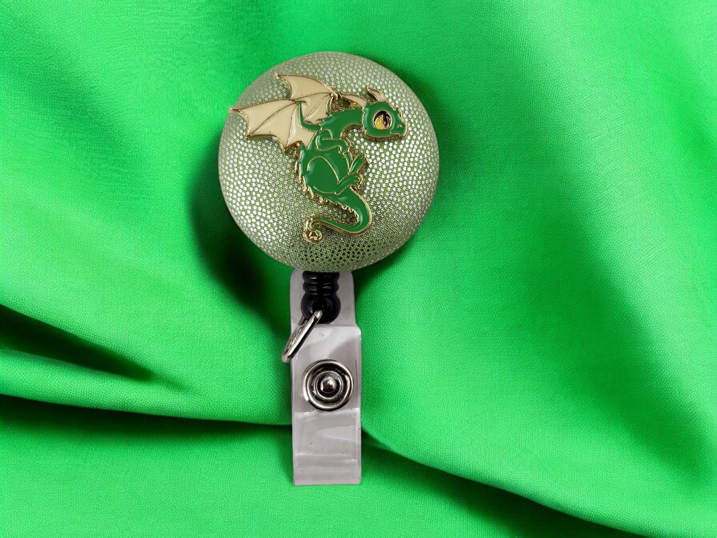 badge reel, green and gold dragon