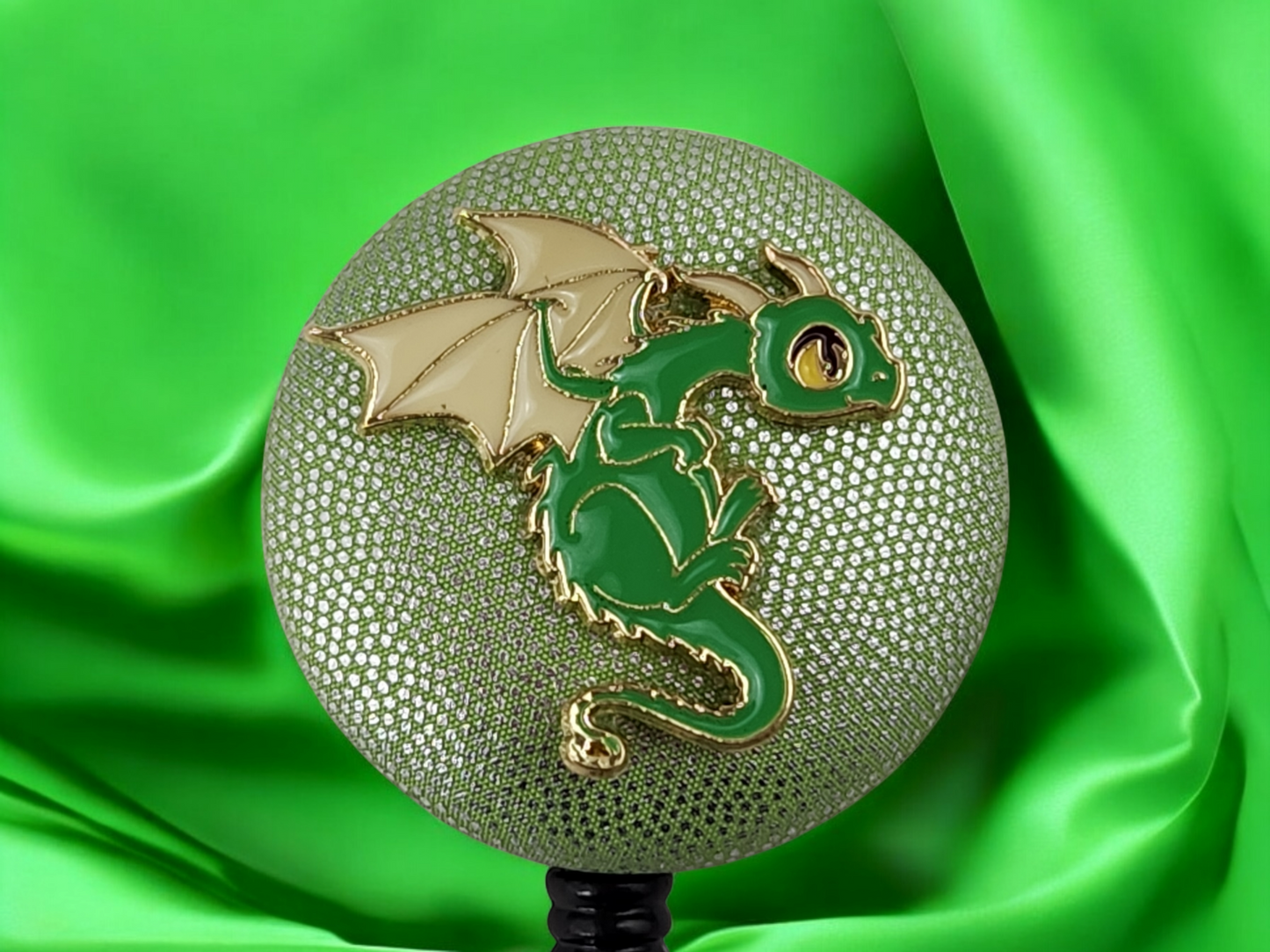 badge reel, green and gold dragon