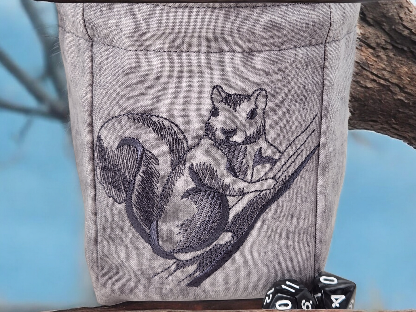 Gray squirrel on branch dice bag