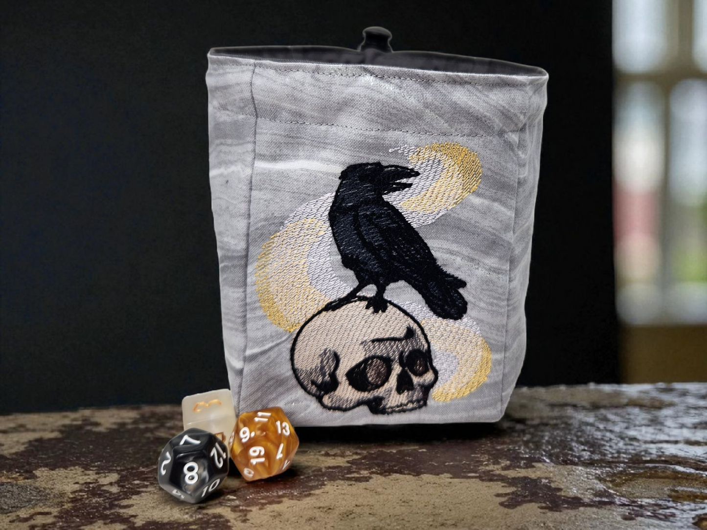 Raven, skull and magic dice bag