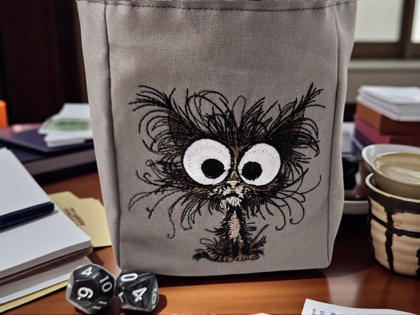 Frazzle cat gift set, dice bag and dice tray.