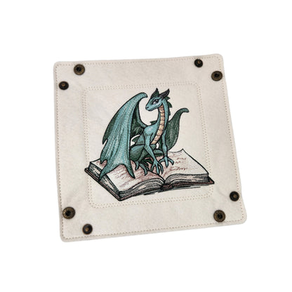 Green dragon sitting on spell book dice tray