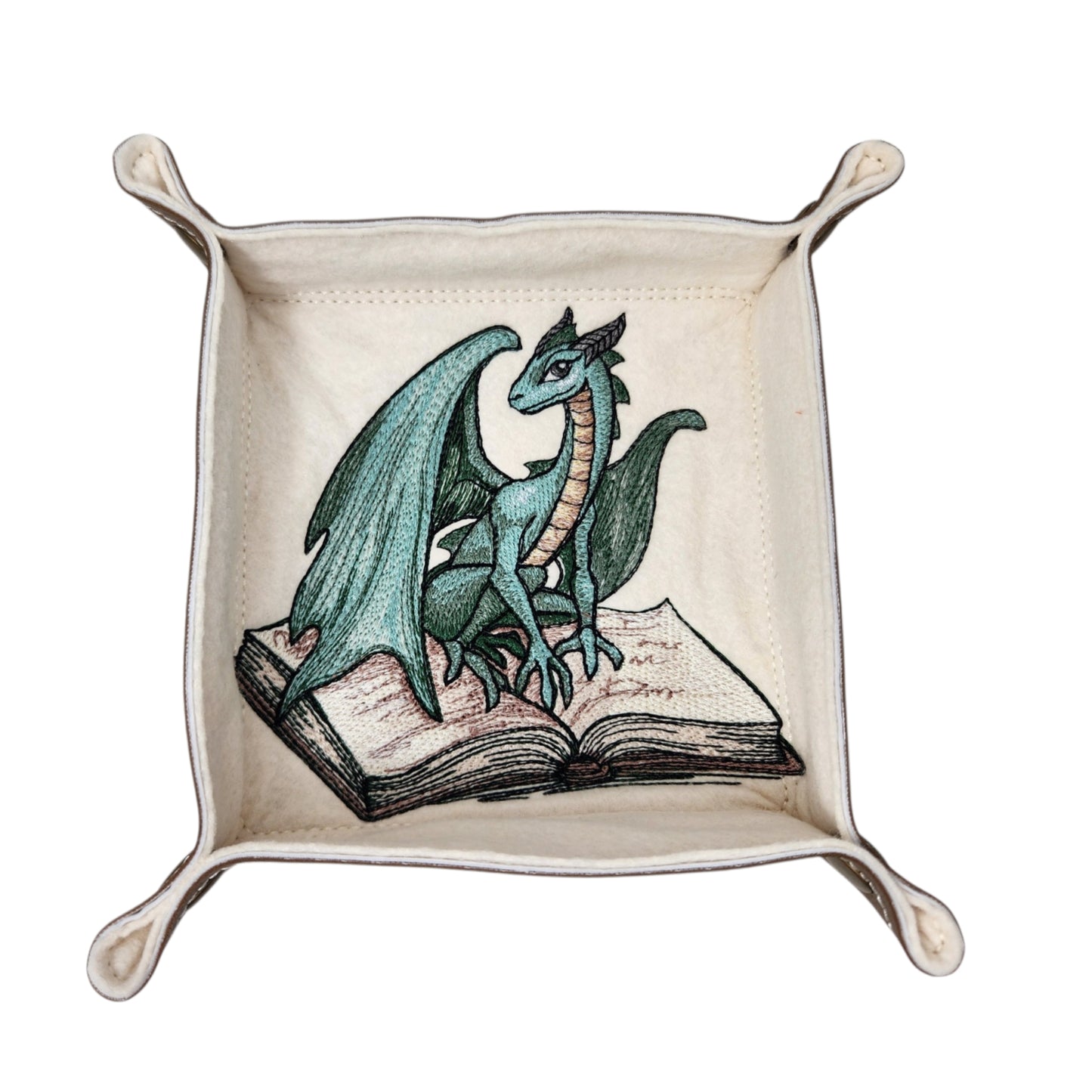 Green dragon sitting on spell book dice tray