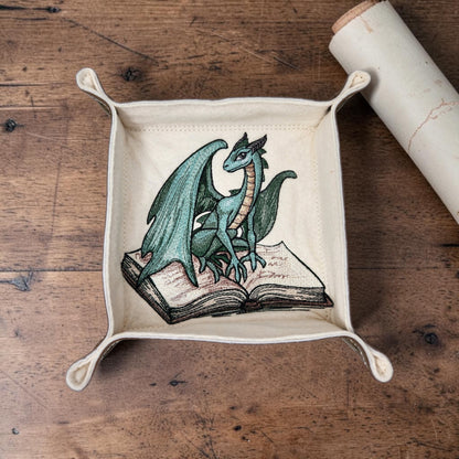 Green dragon sitting on spell book dice tray
