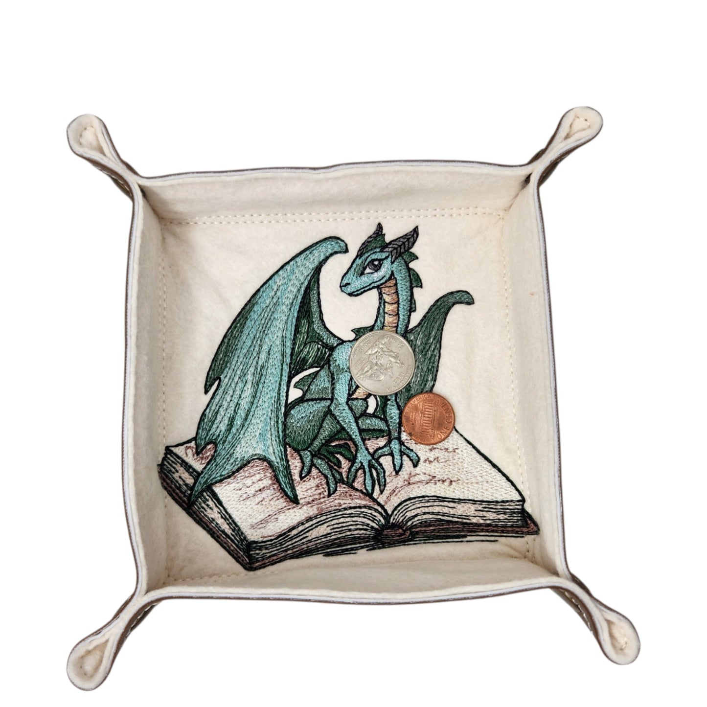 Green dragon sitting on spell book dice tray