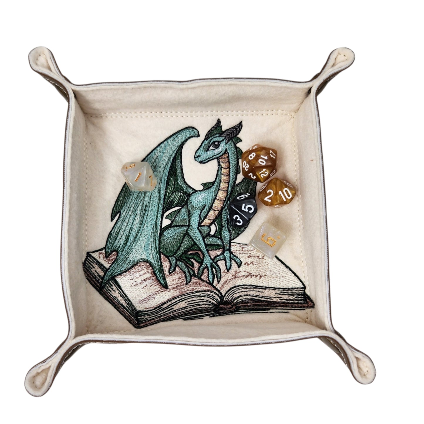 Green dragon sitting on spell book dice tray