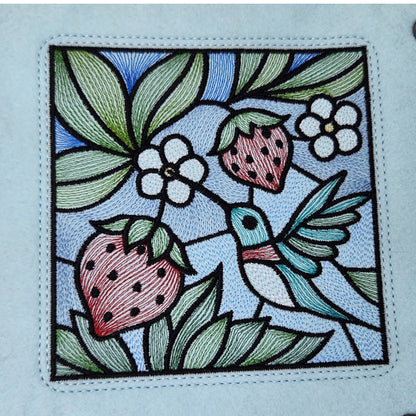 Hummingbird and strawberry dice tray, stained-glass design