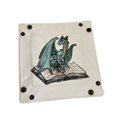 Green dragon sitting on spell book dice tray