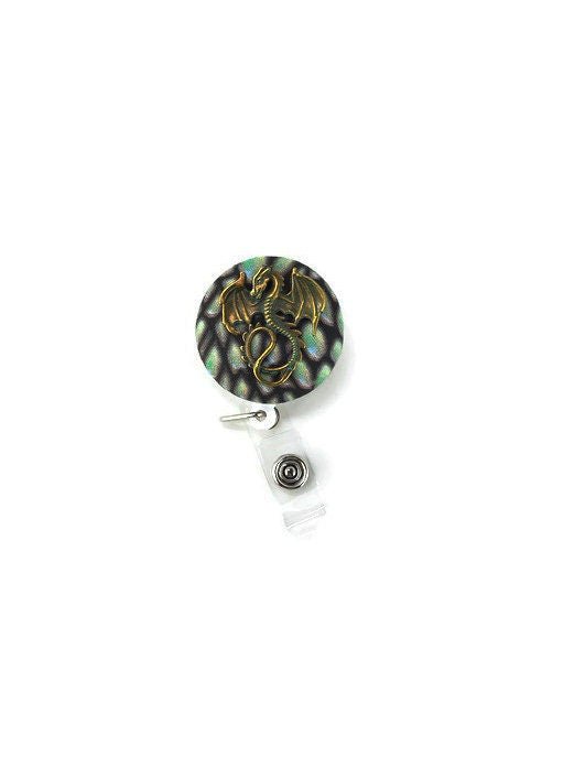 badge reel, green and gold dragon - Rowan Gate