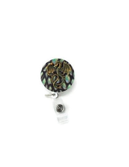 badge reel, green and gold dragon - Rowan Gate