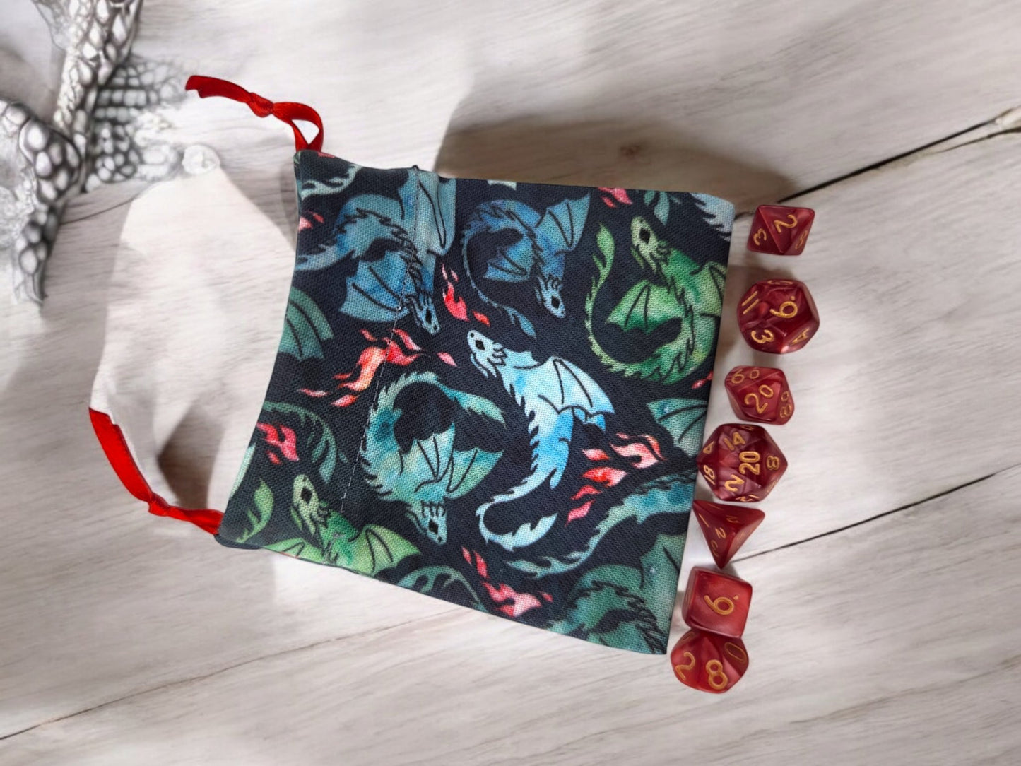 Mini dragon drawstring bag with a set of mini dice, dark red dice - Rowan Gate