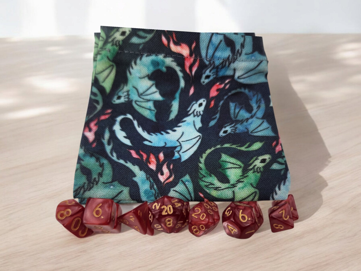 Mini dragon drawstring bag with a set of mini dice, dark red dice - Rowan Gate